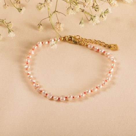 BOUNTY pearl bracelet with fuchsia knot