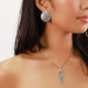 silvered round clip earrings "Viper" - Ori Tao