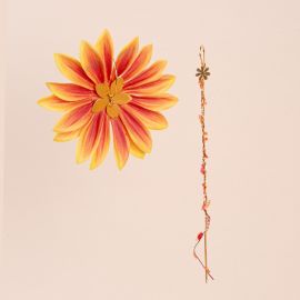 Asymmetrical “TESS” curls with orange tiare flower - Rosekafé